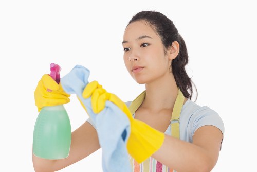 Office cleaner working in a Chiswick business reception area